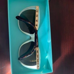 Tiffany powdered rim sunglasses,mild discoloration in inside of rim